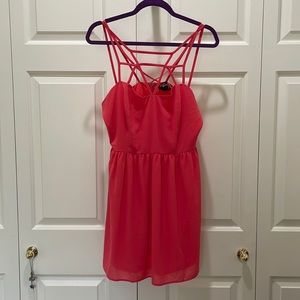 Coral pink mini dress with geometric straps